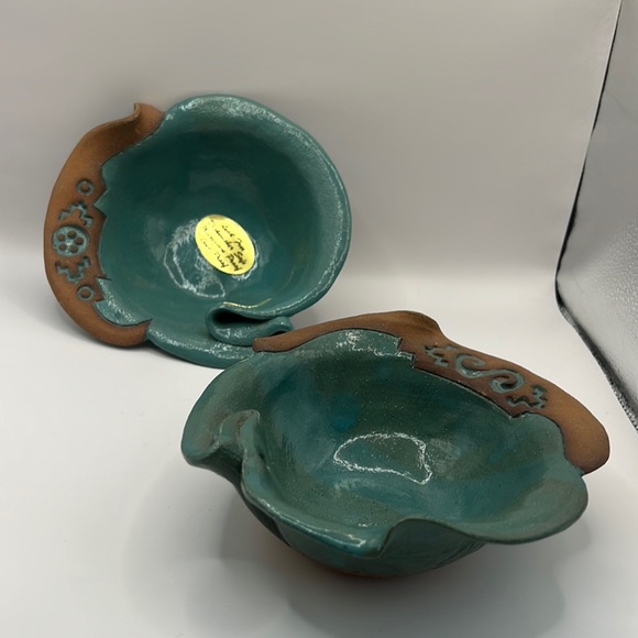 Two small serving bowls artistically made with stone pottery.